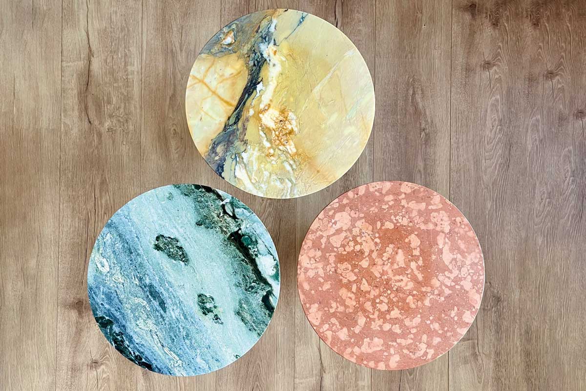 Detail of three bespoke tables in different stone contrast beautifully Detail of three bespoke tables in different stone contrast beautifully