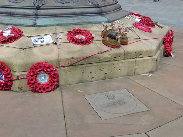 War memorial with bullet marks