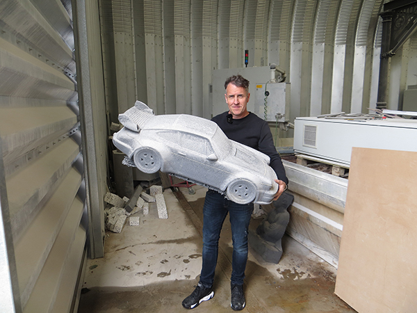 Steve with car model produced on a robot