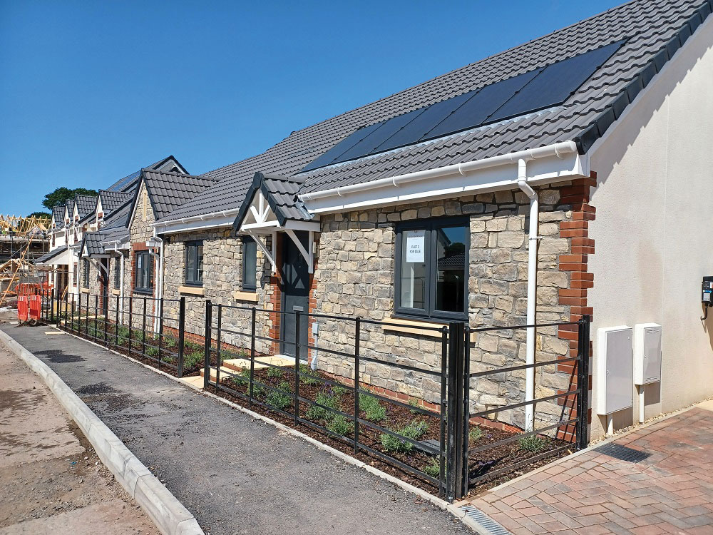 Langton Grey blend combines three grey Purbeck beds from the quarry at Langton Matravers Langton Grey blend used in modern housing development