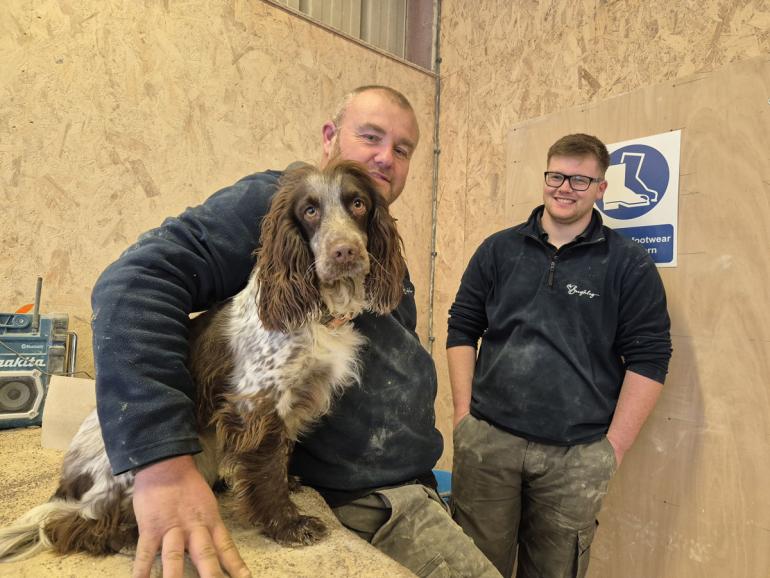 Olive with Mick and Ben in the workshop