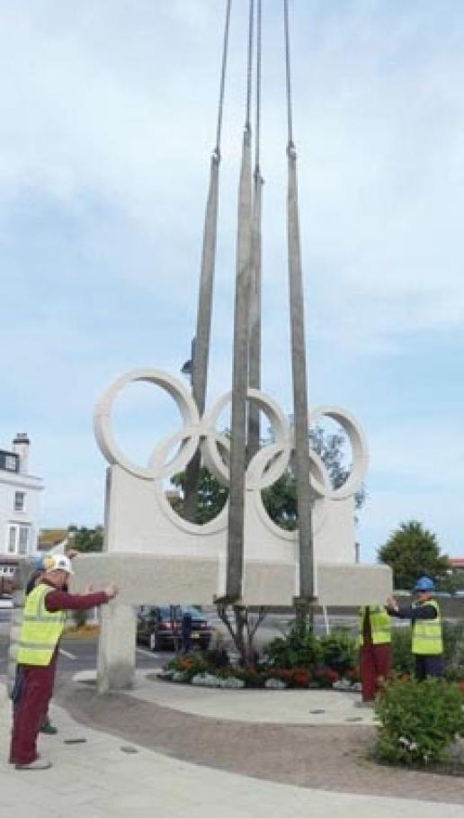The Olympic rings being installed outside the railway station in Weymouth. The Olympic rings being installed outside the railway station in Weymouth.