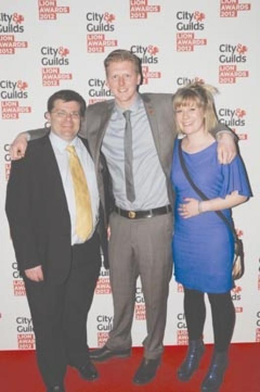 Sam Matthews at the City & Guilds Lion Awards between his girl friend, Sadie Jones, and Nigel Gilkison, the head of stonemasonry at the BCC. Sam Matthews at the City & Guilds Lion Awards between his girl friend, Sadie Jones, and Nigel Gilkison, the head of stonemasonry at the BCC.