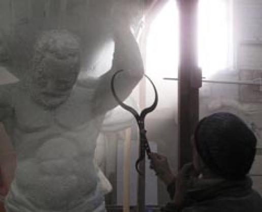 Roughing out the carving. A quick check against the model using proportional callipers. Roughing out the carving. A quick check against the model using proportional callipers.