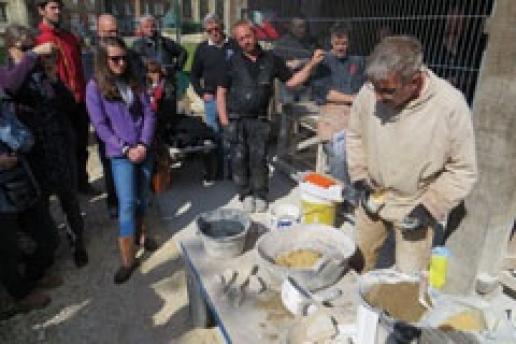 Nigel Copsey demonstrates hot lime mixing during the Building Limes Forum event at York in May. Nigel Copsey demonstrates hot lime mixing during the Building Limes Forum event at York in May.