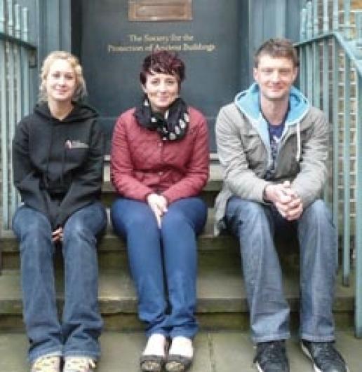 This year's SPAB Fellows include stonemasons Samantha Peacock and Callum Plews, pictured here either side of bricklayer Emily Hale. This year's SPAB Fellows include stonemasons Samantha Peacock and Callum Plews, pictured here either side of bricklayer Emily Hale.