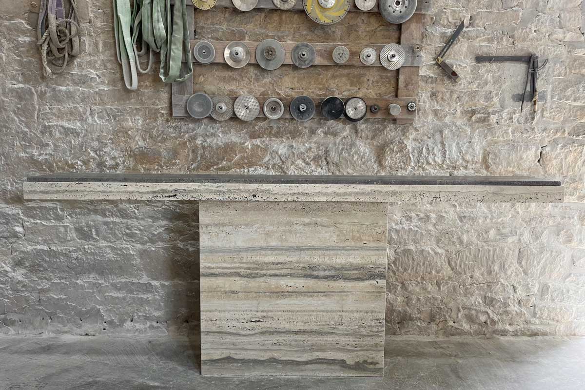 A completed travertine console table in the couple's studio – this was created for a private client A completed travertine console table in the couple's studio – this was created for a private client